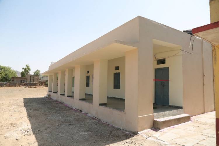 Children smile after getting newly built Classes & Toilets