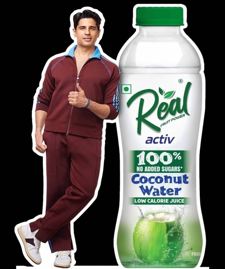 Your Daily Dose of Summer Cool: Dabur Real Coconut Water.